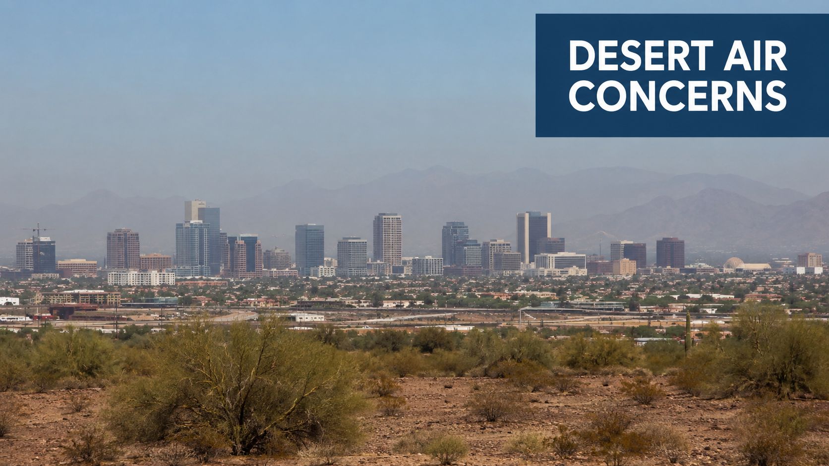 The Phoenix city skyline viewed from a desert landscape, highlighting hazy air quality conditions in Arizona.